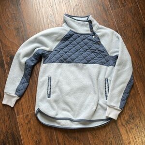 Pull over jacket style sweater. Soft blue Sherpa with navy quilting.